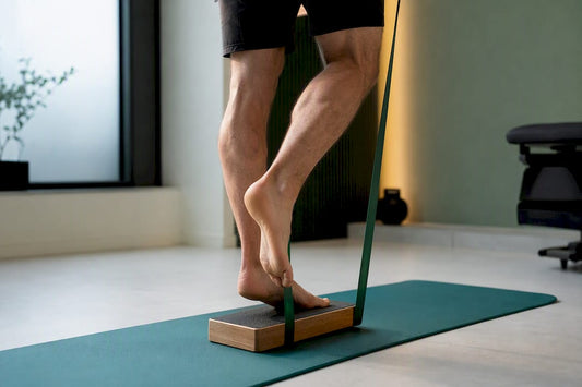 Athlete performing controlled Achilles rehabilitation exercise